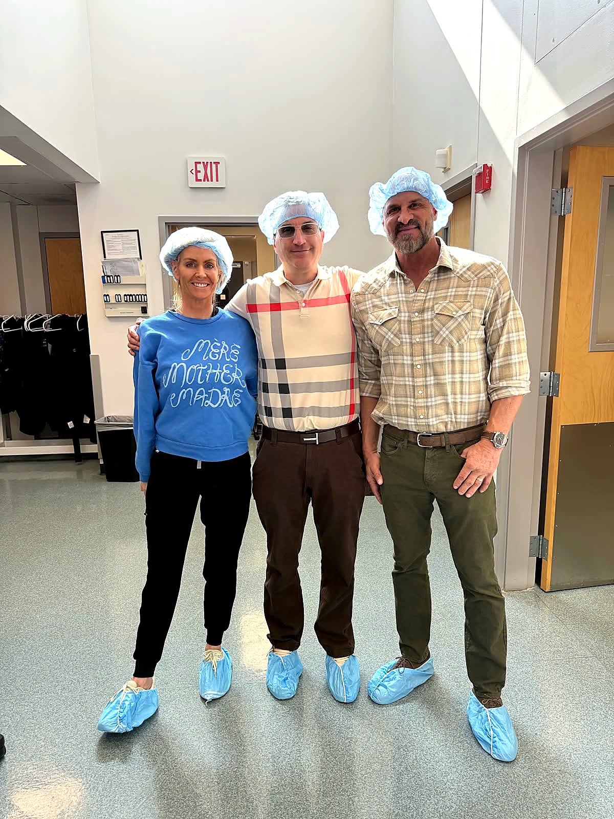 Andrew Hillman with others in a clinical setting.
